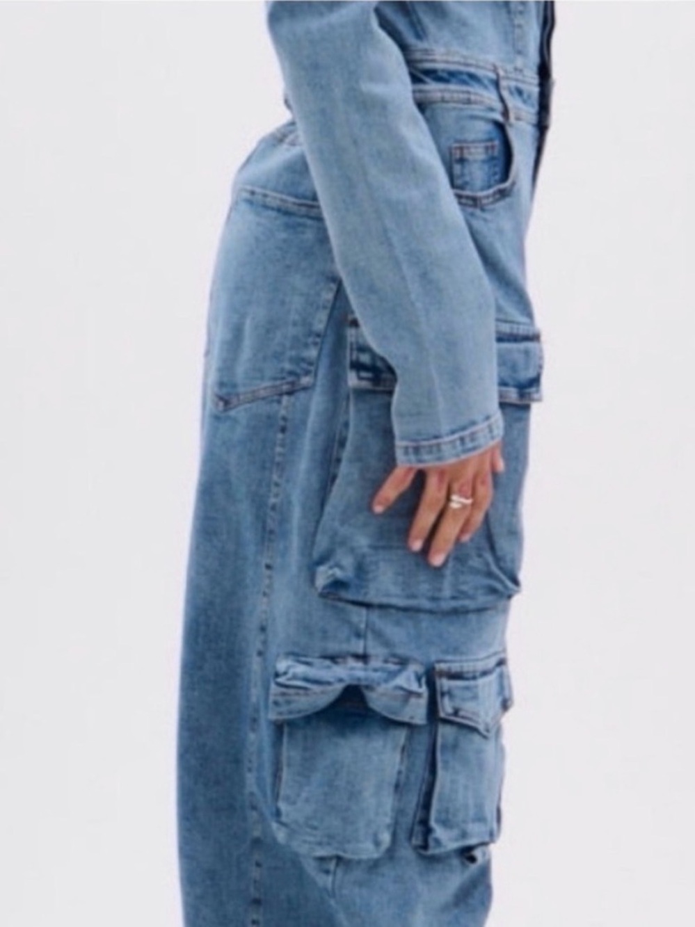 AKIRA Off-Shoulder Denim Cargo Jumpsuit in Medium Blue - Picture 7 of 8